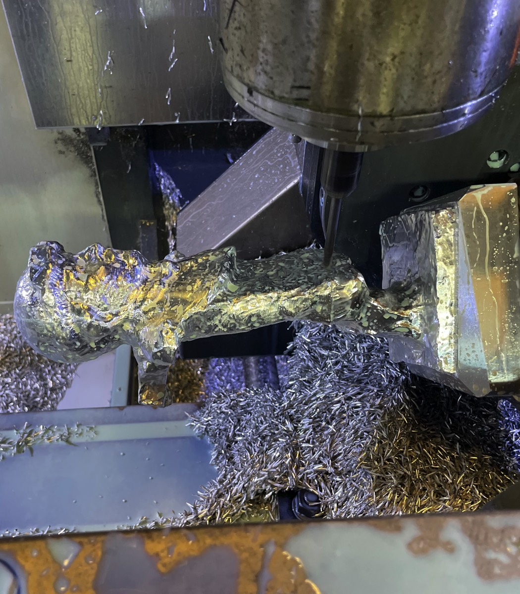 Custom trophy being machined on a 5-axis CNC mill at Hooper Machine & Design