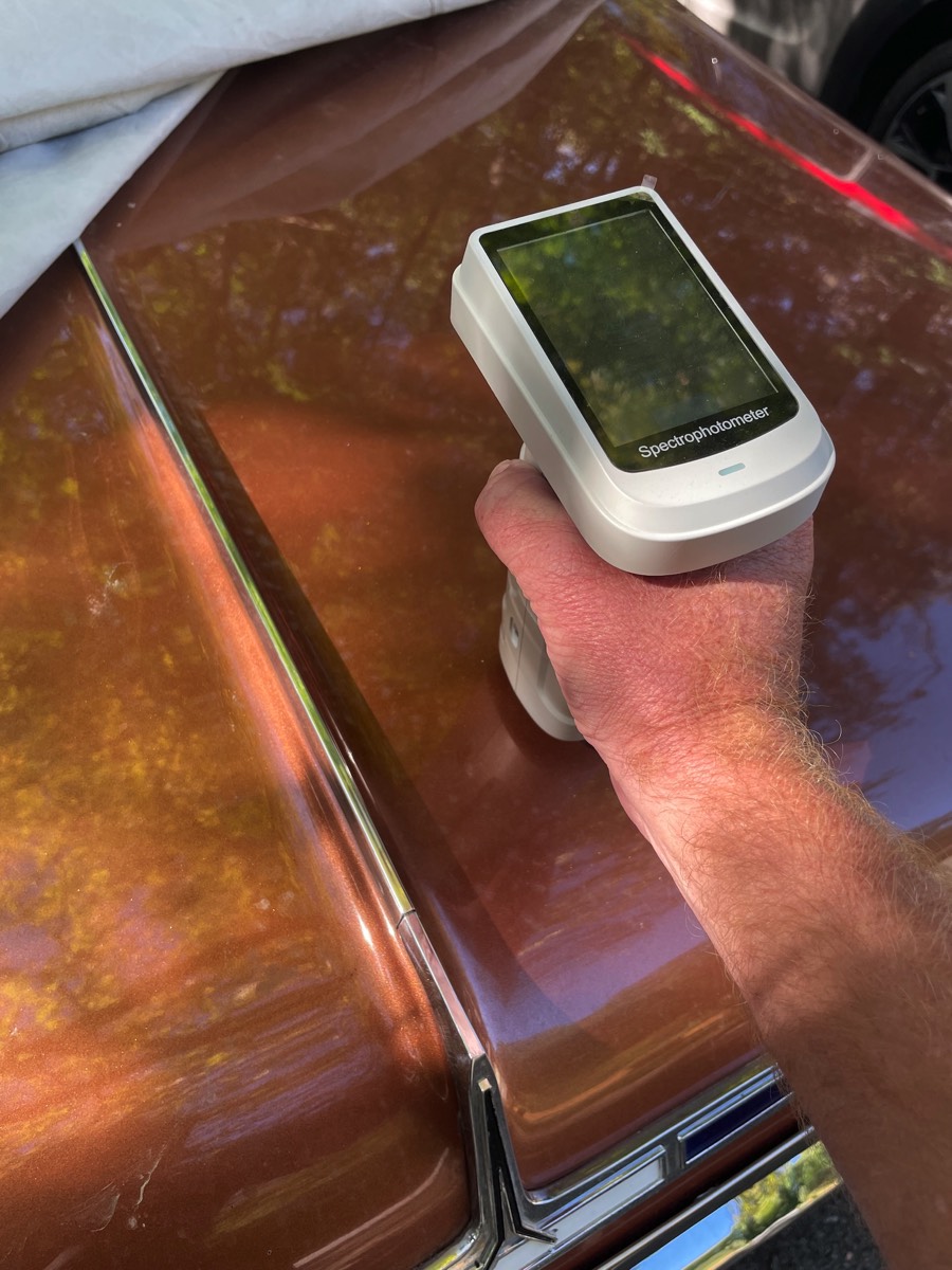 Spectral photometer used to identify and match paint color on a classic car part at Hooper Machine & Design