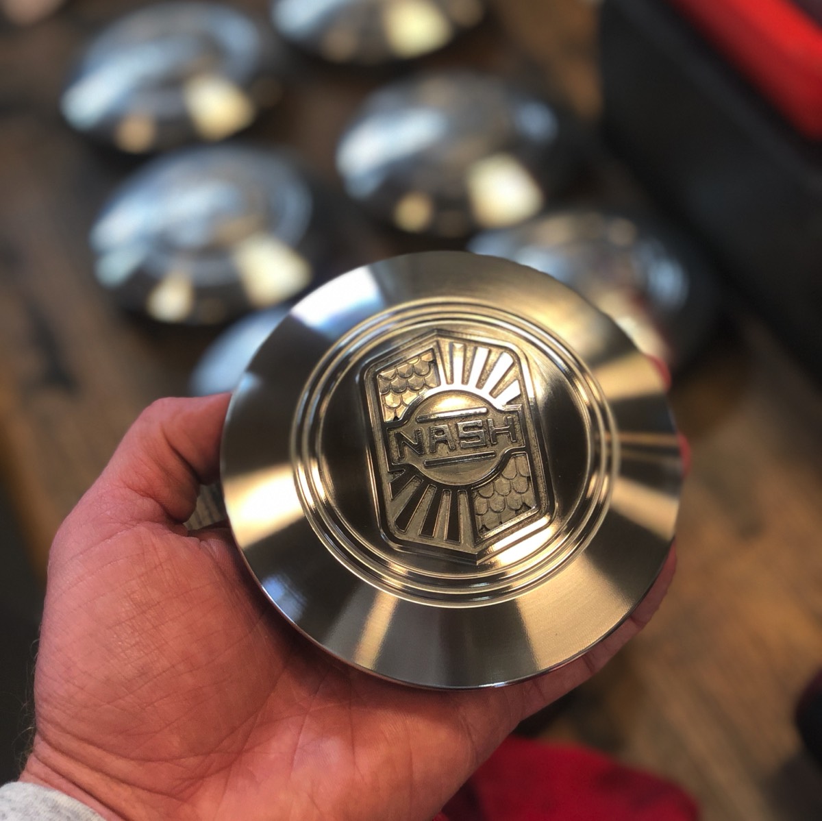 Machined centerpiece for 1927 Nash hubcap, reverse engineered by Hooper Machine & Desig
